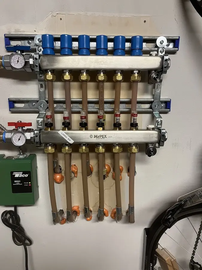 Plumber performing Water Heater Repair at a residential property in Coralville